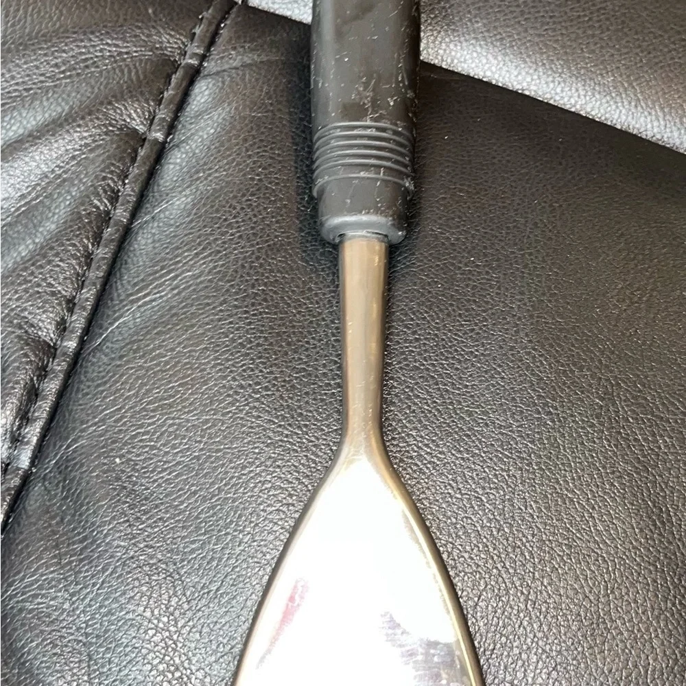 Stainless steel curved potato masher